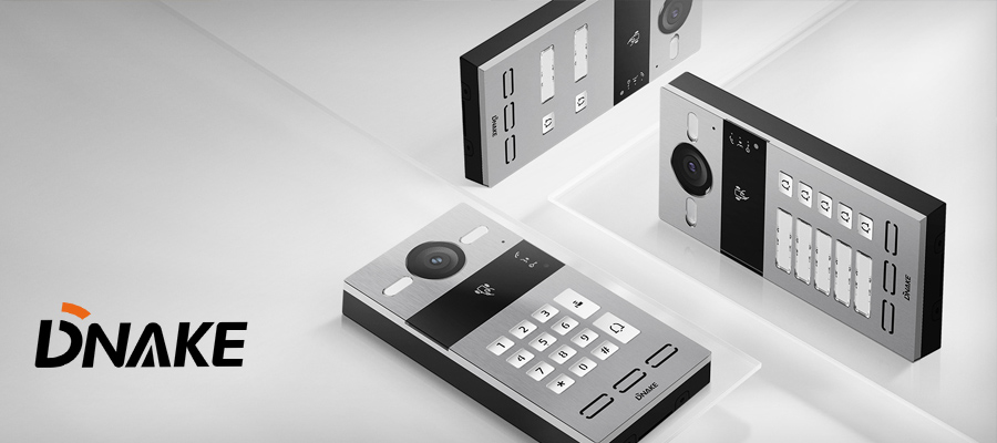 DNAKE Intercoms on white surface with DNAKE logo